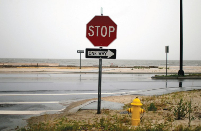 A STOP sign at a crossroads (photo credit: REUTERS)