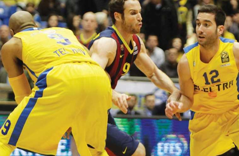 Maccabi Tel Aviv guard Yogev Ohayon (right) has stepped up his play in recent weeks and the yellow-and-blue will need him to be at his best yet again to have any chance of beating Real Madrid tonight in Euroleague action at Yad Eliyahu Arena. (photo credit: ADI AVISHAI)