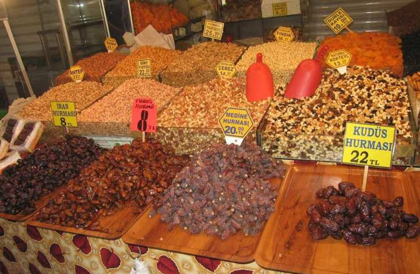 Dates from Iran, Tunisia and Saudi Arabia at an Istanbul market; the most expensive ones are from Israel. (photo credit: YAKIR LEVY)