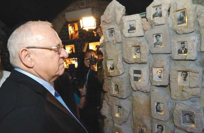 PRESIDENT REUVEN RIVLIN visits Hebron yesterday to mark the renovation of a museum commemorating Jews who were massacred there in 1929. (photo credit: Mark Neiman/GPO)