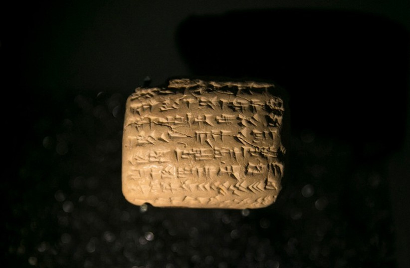 Cuneiform tablet detailing the daily life of exiled Jews in ancient Babylon (modern-day Iraq) 2,500 years ago, displayed at the Bible Lands Museum in Jerusalem (photo credit: REUTERS)