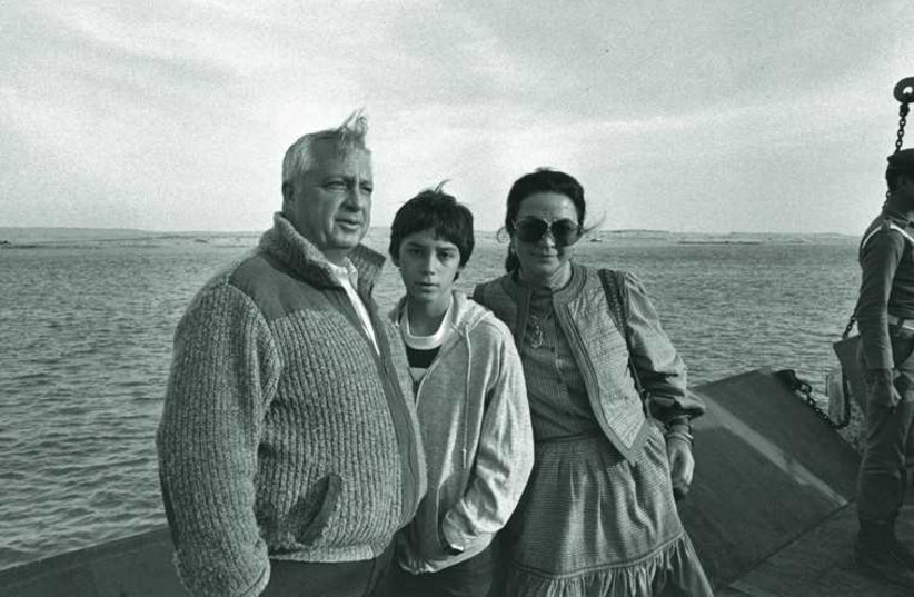 Ariel Sharon, then defense minister, with his wife Lily and their son, Gilad, while visiting the Suez Canal area in Egypt on January 19, 1982 (photo credit: GPO/REUTERS)