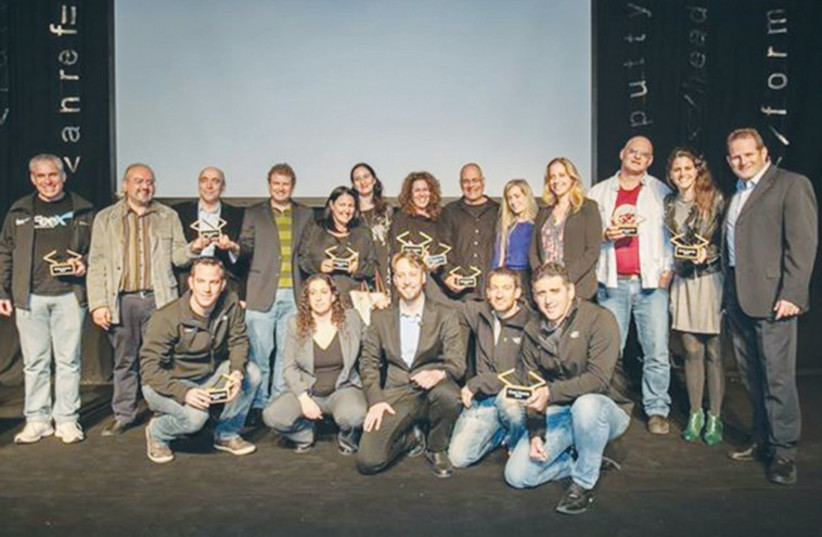 THE WINNERS of the 2014 Geek Awards for Israel’s best startups pose for a group picture at last week’s ceremony in Tel Aviv. (photo credit: Courtesy)