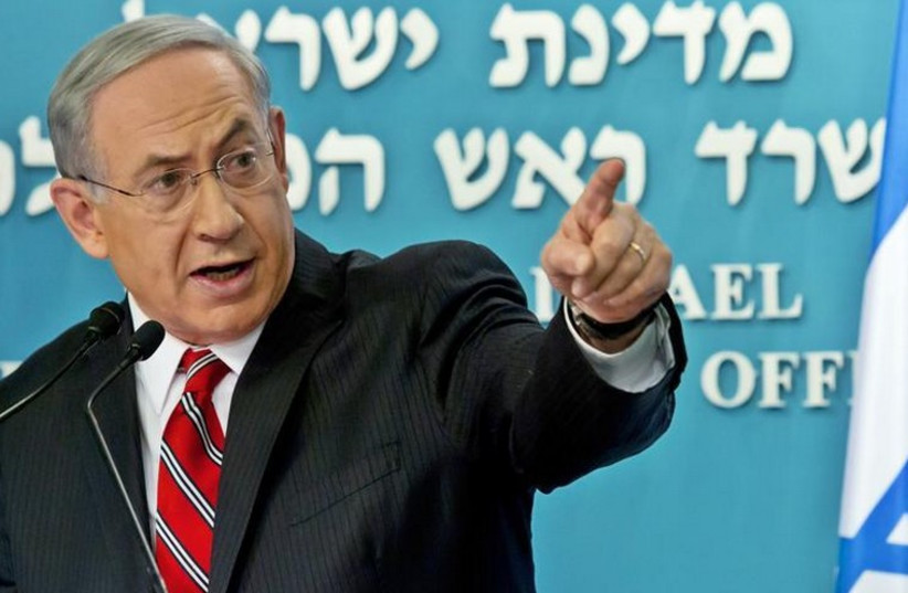 Prime Minister Benjamin Netanyahu gestures during a news conference at his office in Jerusalem (photo credit: REUTERS)