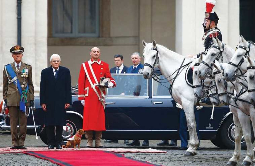 ITALY’S NEW President Sergio Mattarella arrives to inspect a guard of honor at the Quirinale Palace in Rome, February 3, 2015 (photo credit: REUTERS)
