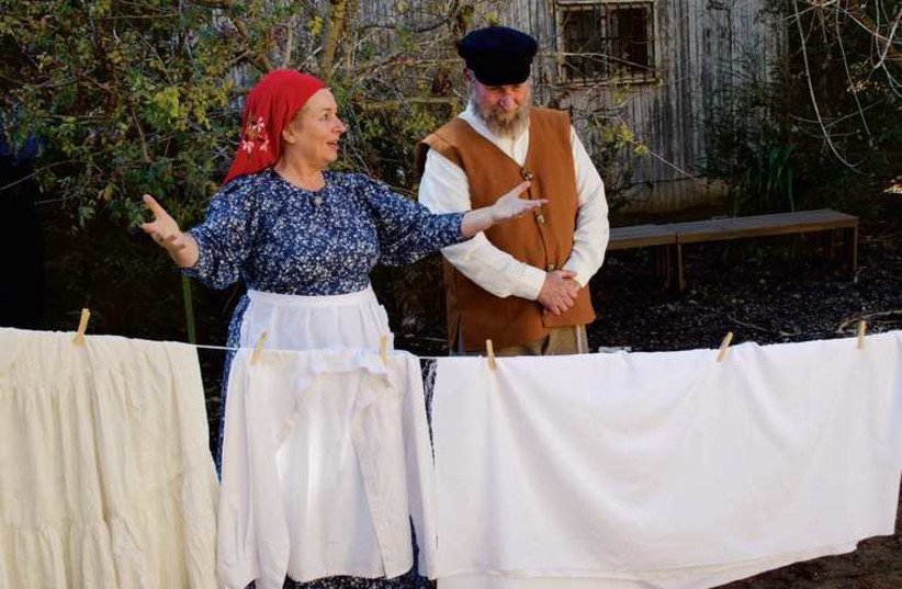 Tevye (Eric Isaacson) and Golde (Patrice Perez) in a scene from LOGON’s production of ‘Fiddler on the Roof.’ (photo credit: ARMAND PEREZ)