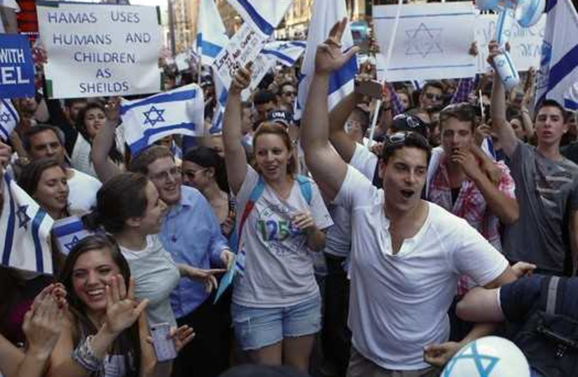 Young Jews rally in support of Israel in New York, July 20. (photo credit: EDUARDO MUNOZ / REUTERS)
