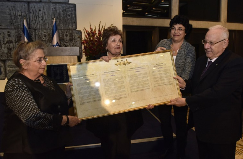 Left to right: President Reuven Rivlin, Shirly Shavit, director of Na'amat International Department, Masha Lubelski, Na'amat representative of the World Zionist Organization and First Lady Ruhama Rivlin. (photo credit: ISRAEL MALOVANI)