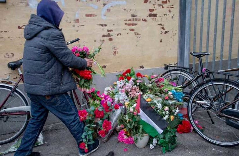 Flowers at site where gunman, Omar Abdel Hamid El-Hussein was killed in Norrebro district, Copenhagen (photo credit: REUTERS)