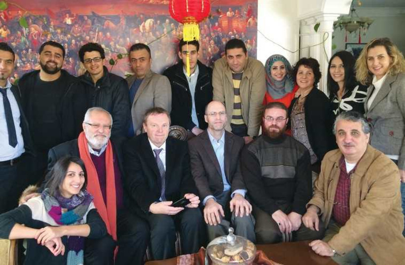 The inaugural class of Palestinian PhD candidates and the German professors embarking on the program. Prof. Mohammed Dajani Daoudi is bottom, second from left. (photo credit: Courtesy)