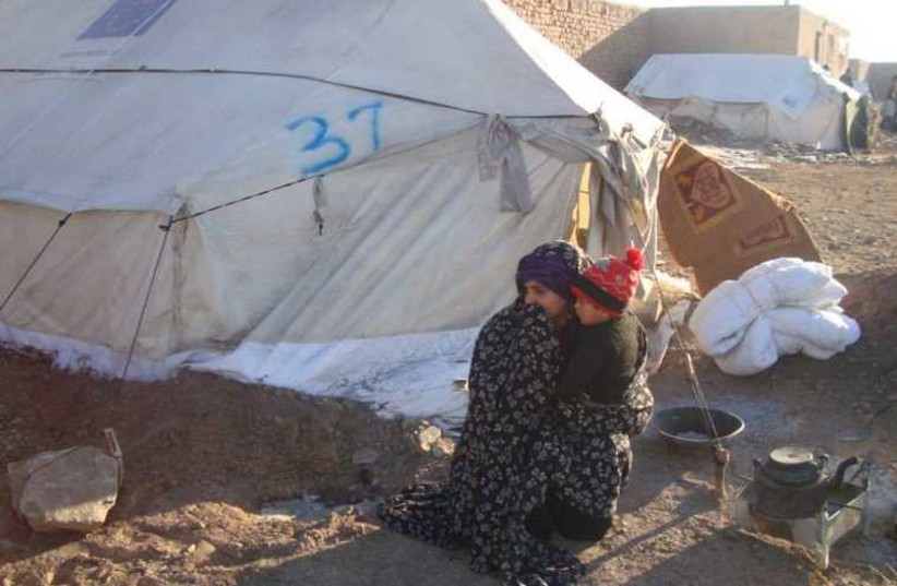 Refugees in Afganistan that the JRS works with (photo credit: JESUIT REFUGEE SERVICE)