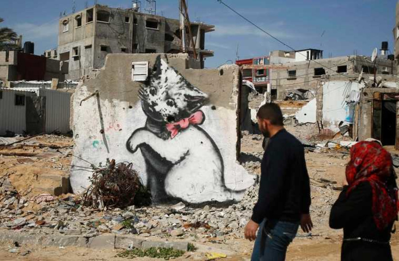 Graffiti by British street artist Banksy in Beit Hanoun in Gaza (photo credit: REUTERS)