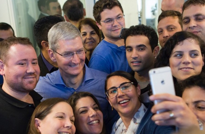 Tim Cook, Apple’s CEO, meeting the employees at the new Apple office in Herzliya (photo credit: Courtesy)