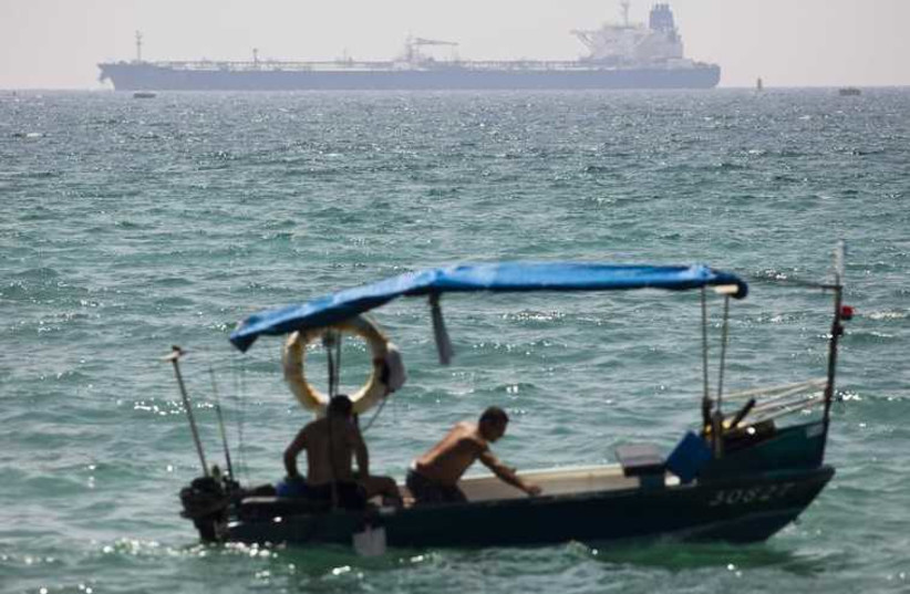 A Kurdish oil tanker is seen off the coast of Ashkelon (photo credit: REUTERS)