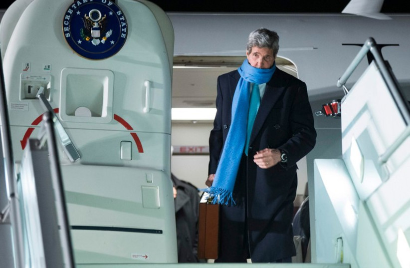 US Secretary of State John Kerry arrives at Geneva International airport  (photo credit: REUTERS)