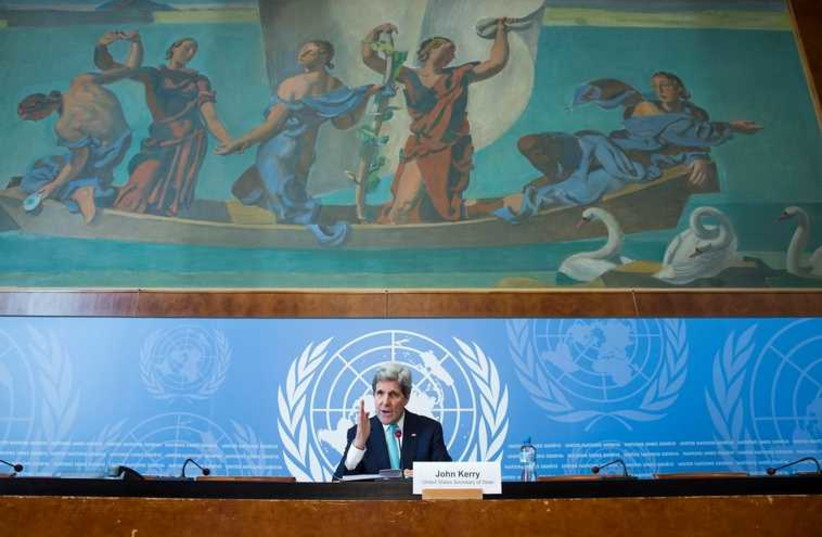  US Secretary of State John Kerry gestures during a news conference after he delivered remarks to the United Nations Human Rights Council in Geneva March 2 (photo credit: REUTERS)