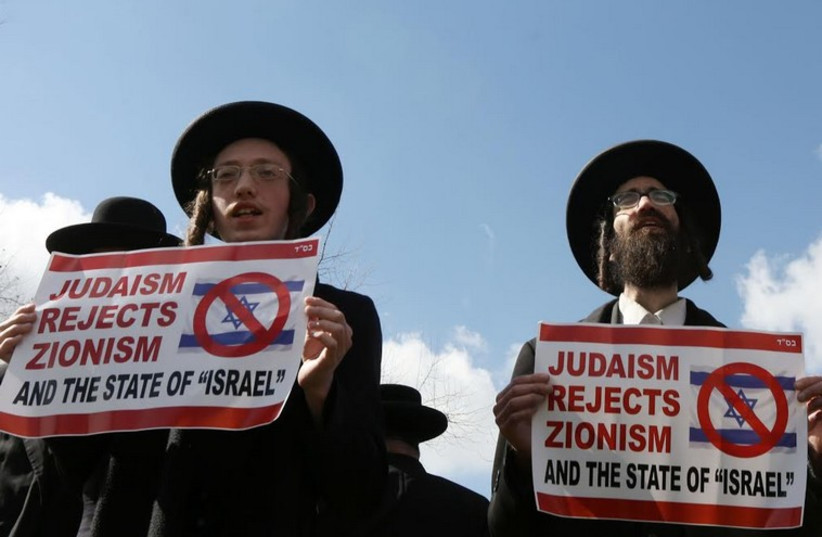 Dozens of haredim gathered in front of the US Consulate-General in Jerusalem on Tuesday to protest against Zionism and Prime Minister Benjamin Netanyahu’s speech before Congress. (photo credit: MARC ISRAEL SELLEM)