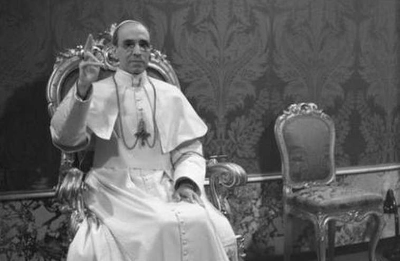 Pope Pius XII, the wartime pontiff, appears in an undated file photo from the archives of Vatican newspaper Osservatore Romano.  (photo credit: REUTERS)