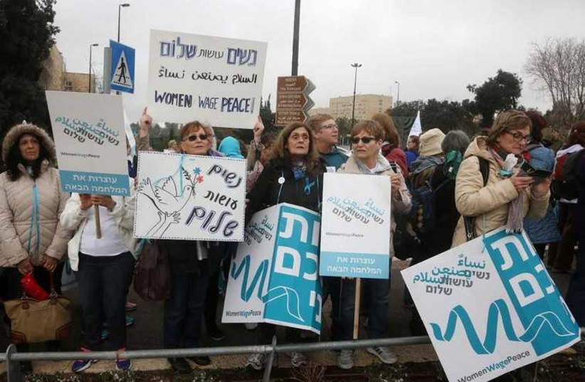 Members of Women Wage Peace gather in the capital from across the country to protest stalled peace negotiations, March 4, 2015 (photo credit: MARC ISRAEL SELLEM/THE JERUSALEM POST)
