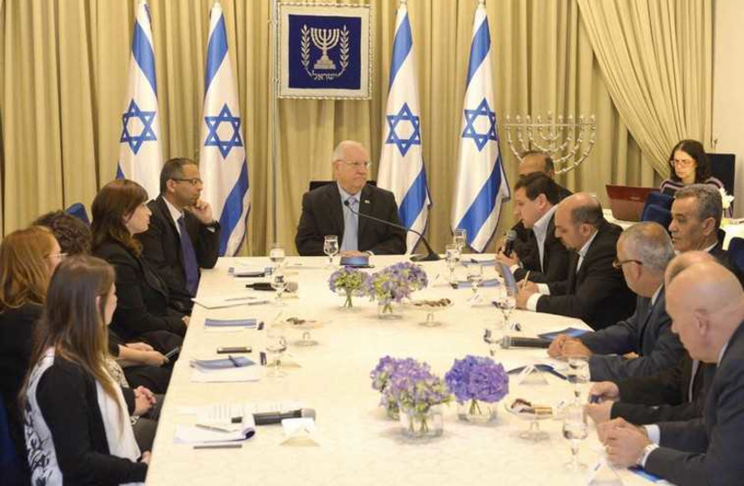 President Reuven Rivlin meets with a delegation from the Joint (Arab) List at his residence March 22 (photo credit: Mark Neiman/GPO)