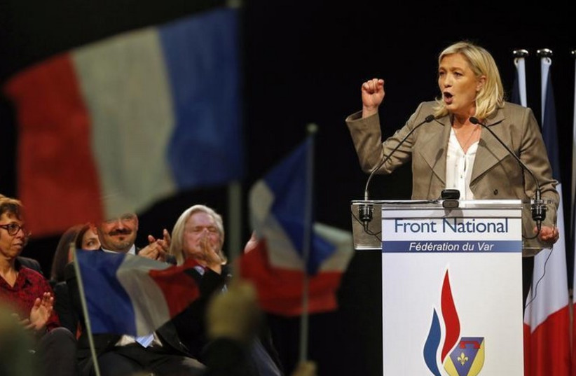 France's far-right National Front political party leader Marine Le Pen delivers a speech during a political rally in Six-Fours, near Toulon (photo credit: REUTERS)