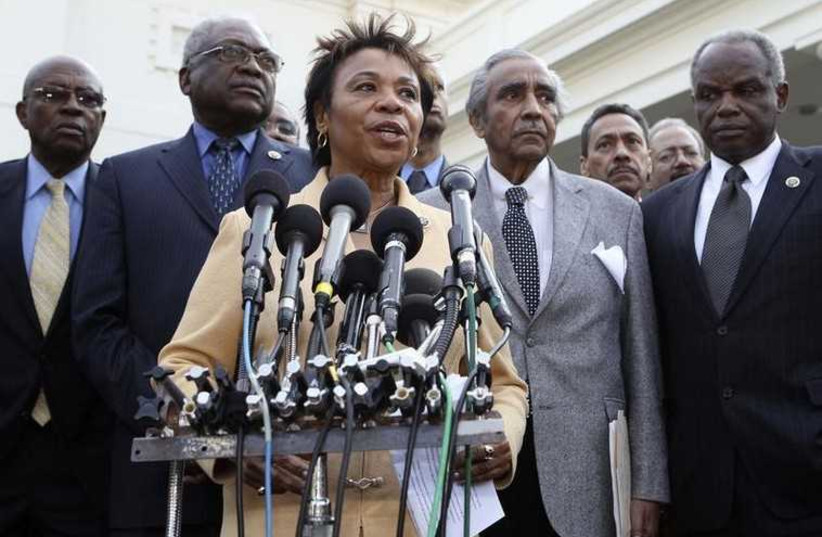 Members of the Congressional Black Caucus, led by Chair Representative Barbara Lee (C), talk to the media following a meeting with US President Barack Obama at the White House (photo credit: REUTERS)