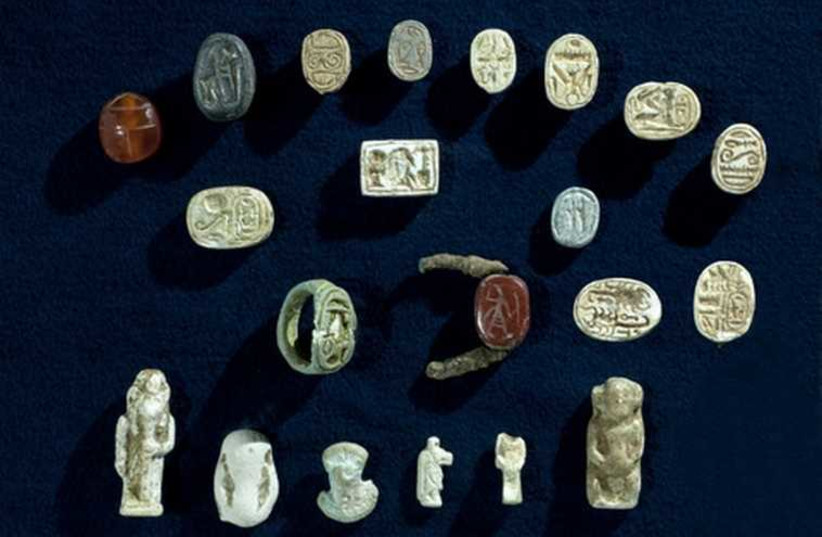 A COLLECTION of ancient jewelry with characteristics of Egyptian culture found in southern Israel cave. (photo credit: CLARA AMIT, COURTESY OF THE ISRAEL ANTIQUITIES AUTHORITY)