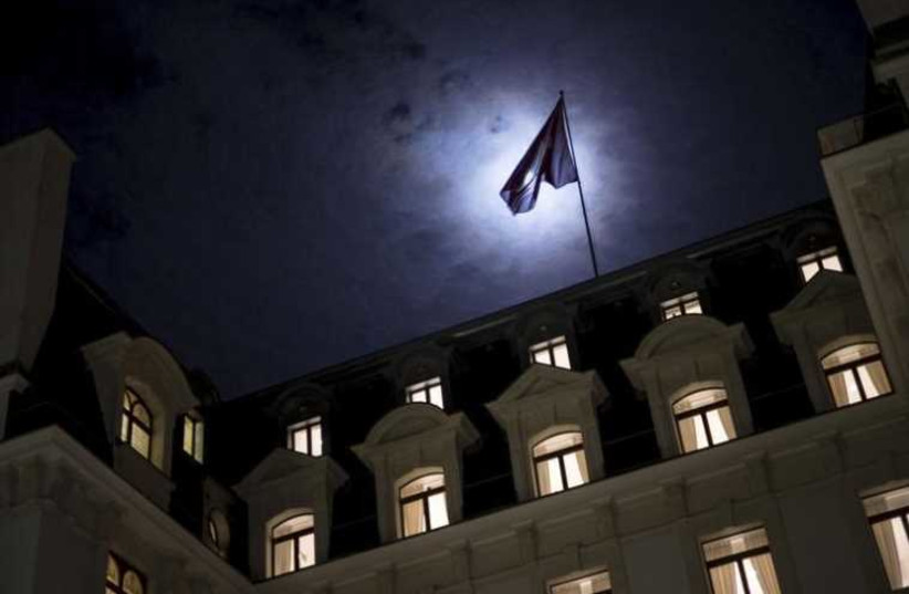 A late night view of the Beau Rivage Palace Hotel during an extended round of Iran nuclear talks in Lausanne (photo credit: REUTERS)