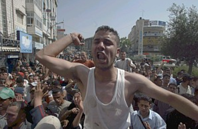 Palestinian riot 298.88 (photo credit: Ahmad Gharabli )