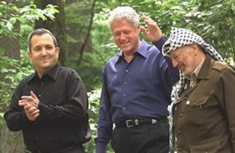Barak, Clinton, Arafat at Camp David 311 AP (credit: AP)