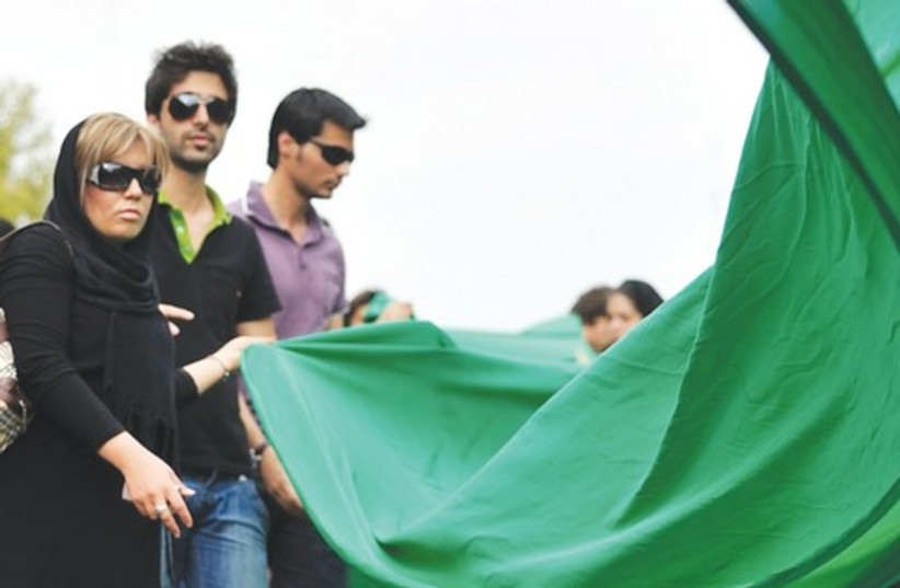 Protesters with green flags