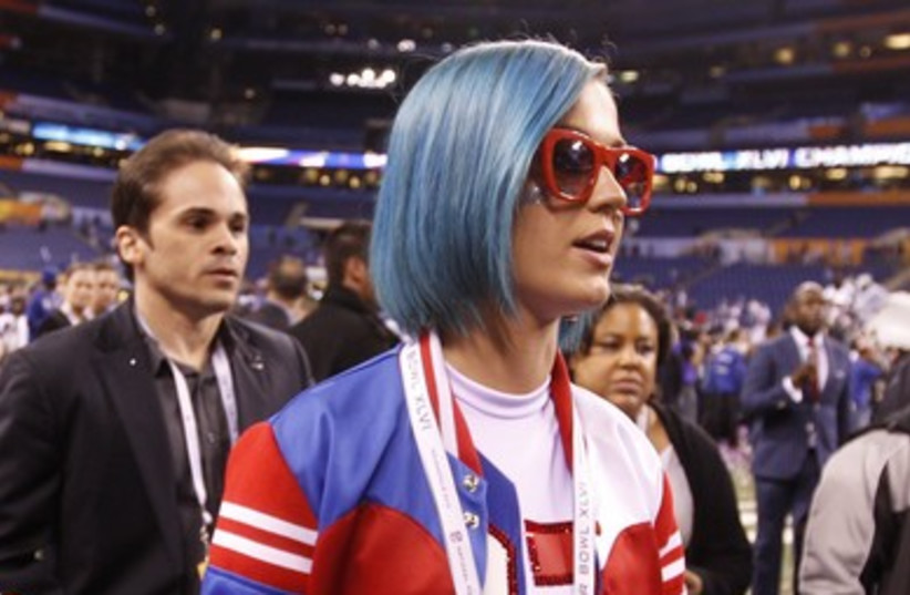 Singer Katy Perry walks off field at end of Superbowl