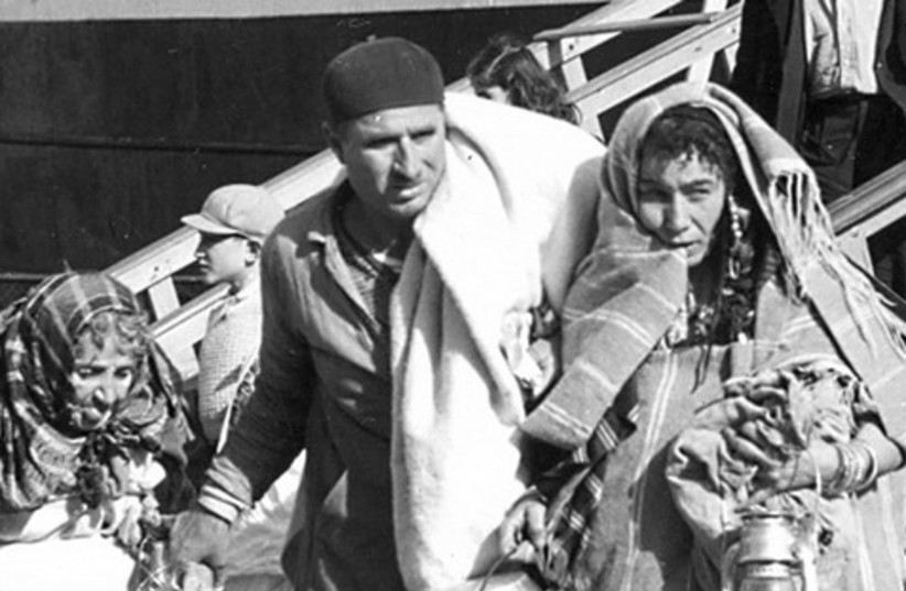 Jewish refugees from Triploi arrive in Haifa 521 (credit: Arnold Behr/Jerusalem Post Archives)