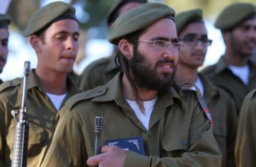 Netzah Yehuda Battalion swear in 370 (credit: Marc Israel Sellem/The Jerusalem Post)