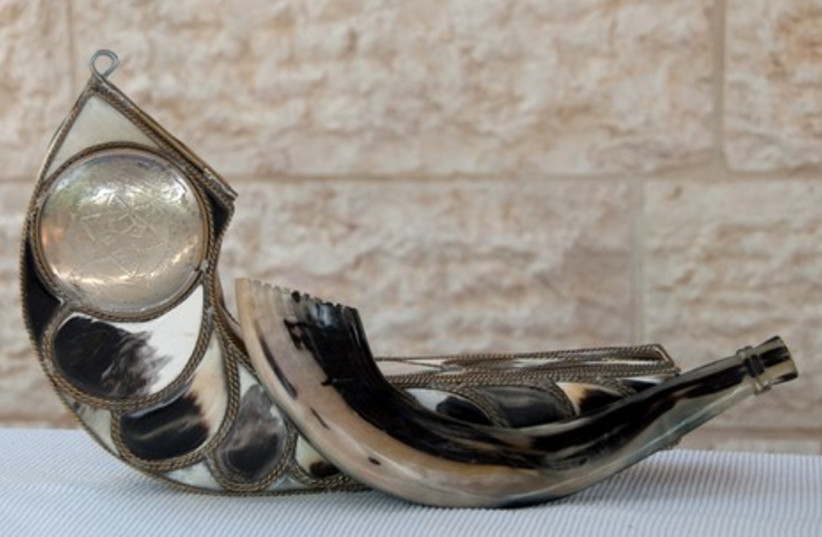 A tradtional Moroccan shofar and case