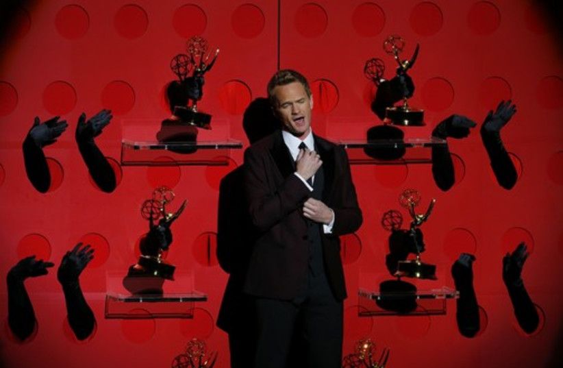 Host Neil Patrick Harris performs a musical number