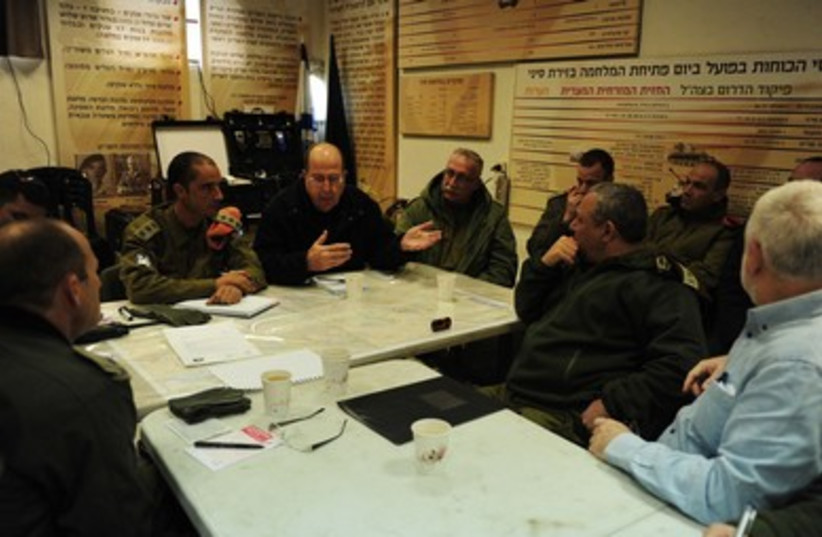 Defense Minister Ya'alon briefs army chiefs 390