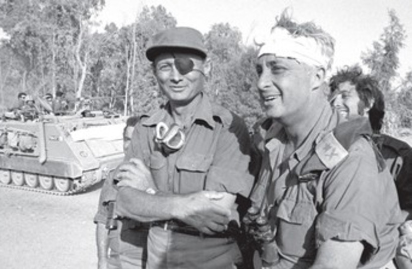 Ariel Sharon with then-Chief of Staff Moshe Dayan, 1955.