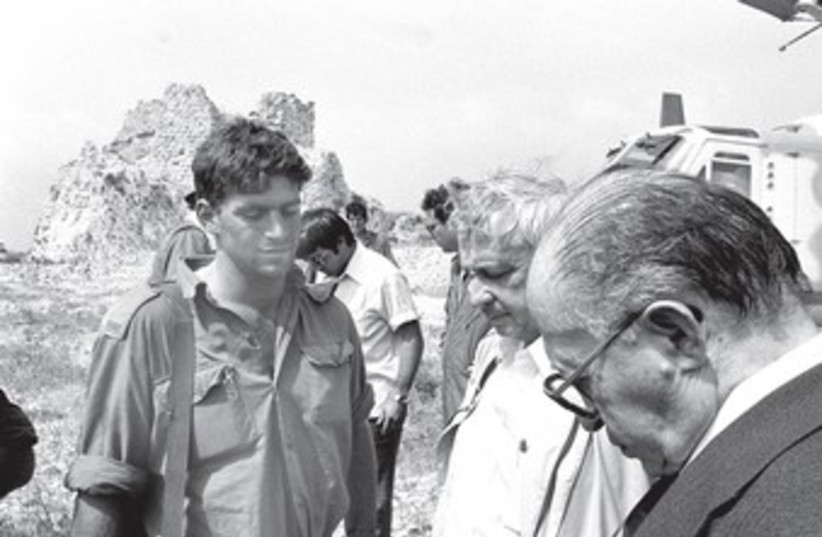 Defense Minister Ariel Sharon and prime minister Menachem Begin with IDF officer after 1982 battle at Beaufort in southern Lebanon.