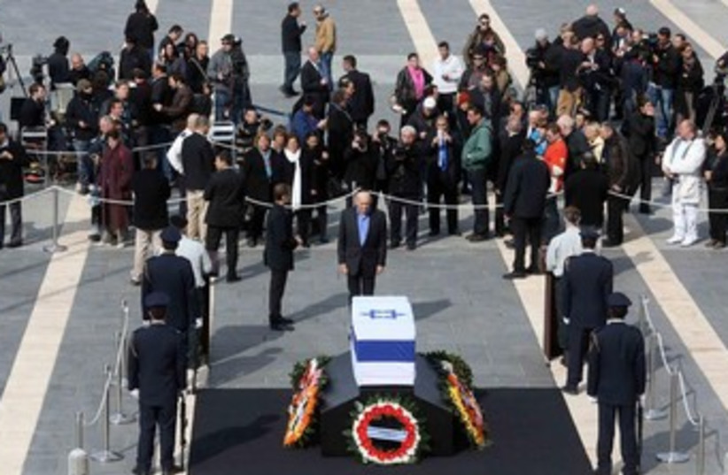 Ariel Sharon's casket lying in state outside the Knesset.