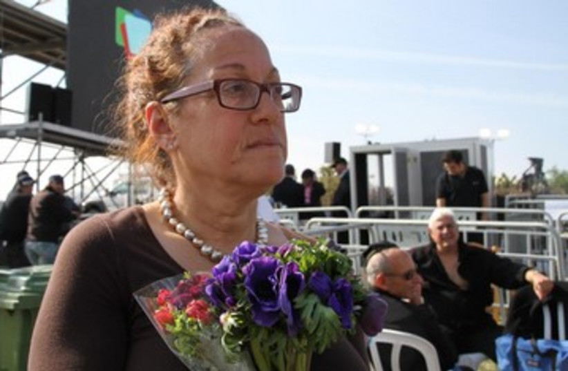 Face of mourner at Ariel Sharon's funeral, January 13, 2014.