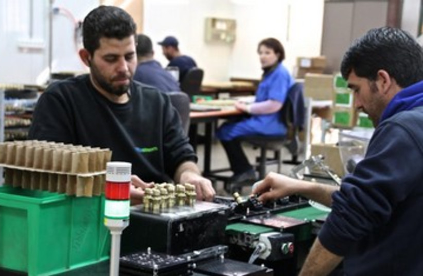 Employees at the SodaStream factory at the ishor Adumim Industrial Park in the West Bank.