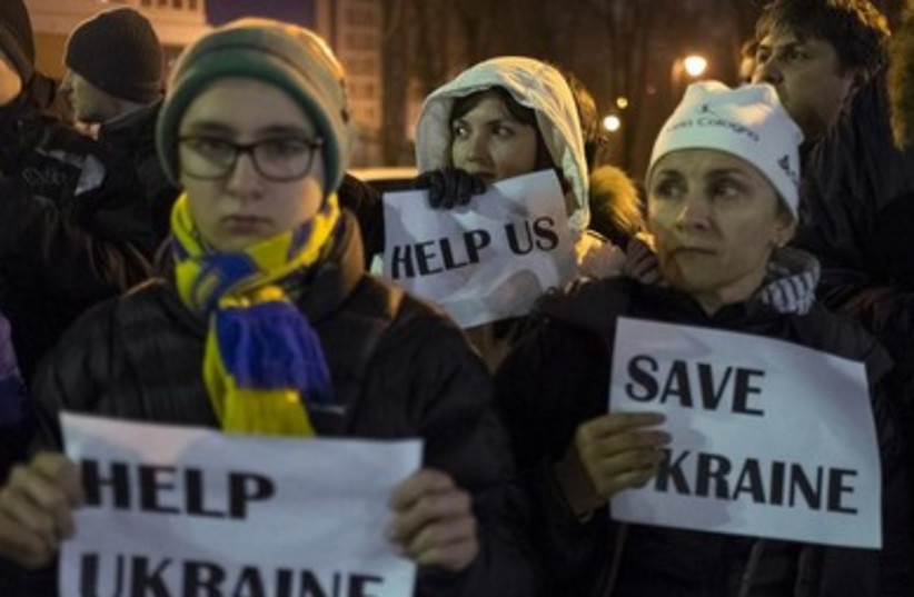 Ukrainians in Kiev rally for Western support.