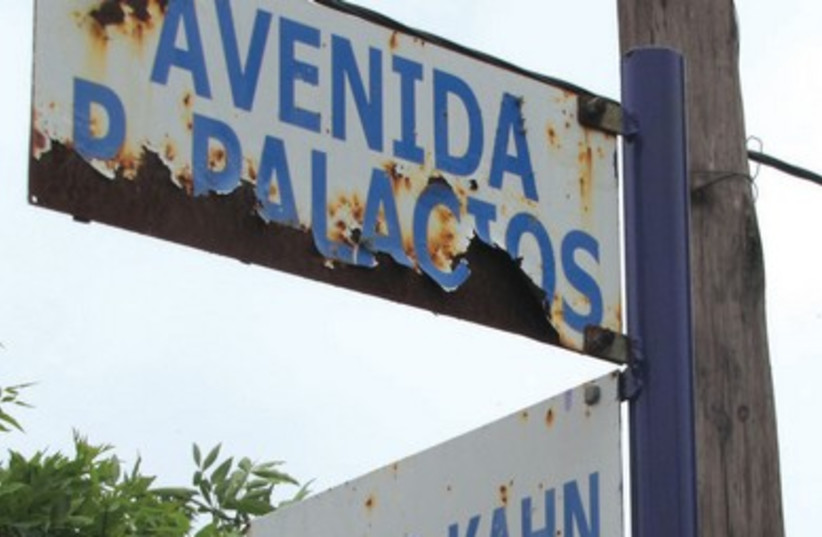 The peeling street sign in Palacios at the intersection of Avenida P. Palacios and Zadoc- Kahn,