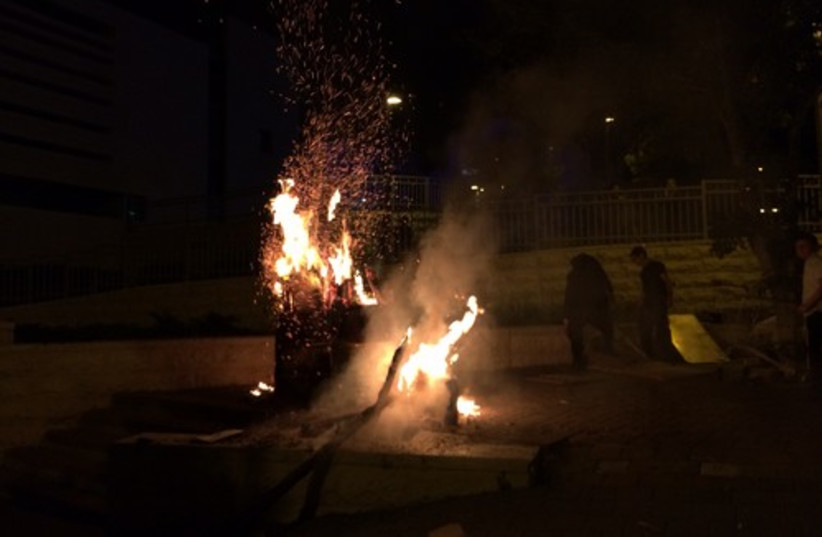 Bonfires lit for the Jewish holiday of Lag Ba'omer in Ramat Beit Shemesh, May 17, 2014.