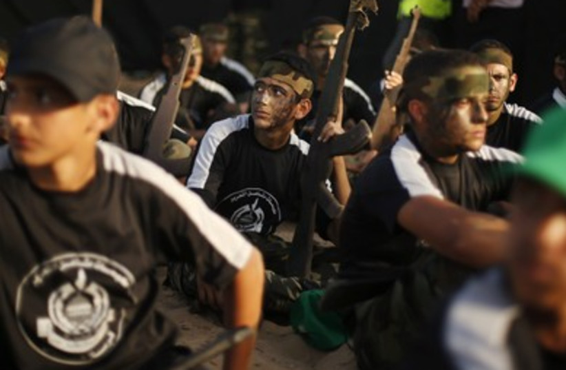 Palestinian youngsters in Gaza take part in a Hamas military training camp.