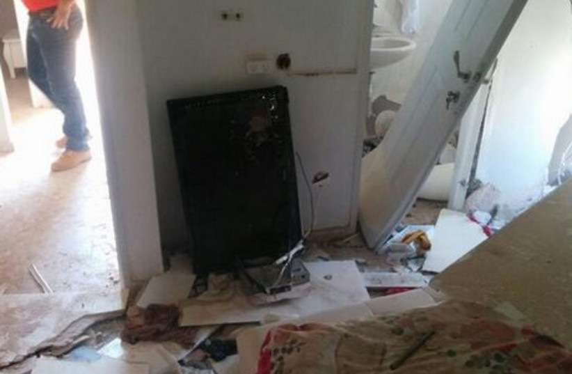 Damage to a home in Sderot from rocket fire Thursday morning