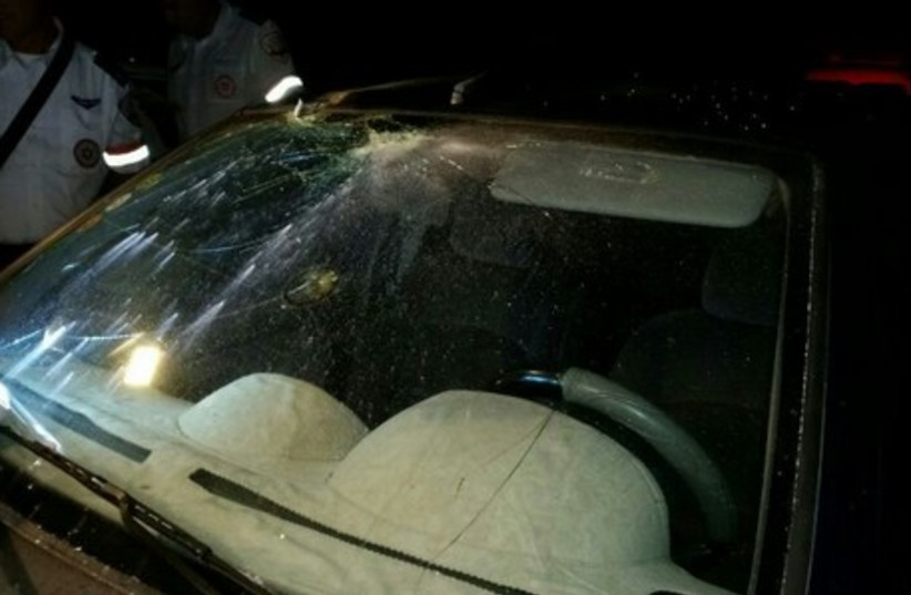Rocket damage on car, July 3 2014