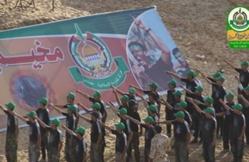 Palestinian children attend a Hamas-run summer camp in Gaza.