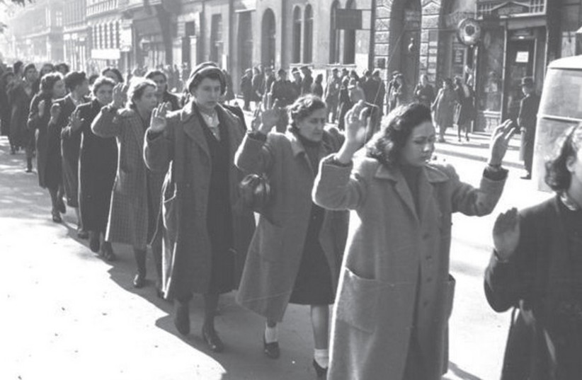 Jewish women are rounded up by Nazis and Hungarian fascists, Wesselényi Street, Budapest, October 1944. (credit: WIKIPEDIA / GERMAN FEDERAL ARCHIVE)